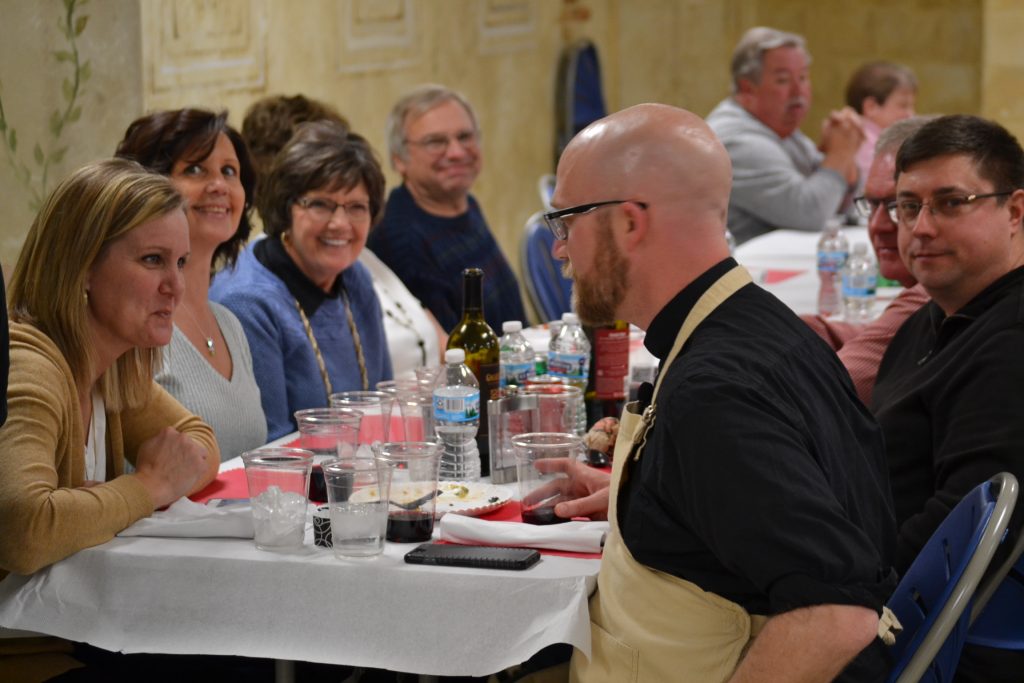 Father Kyle with his family at St. John Neumann (CT Photo/Greg Hartman)