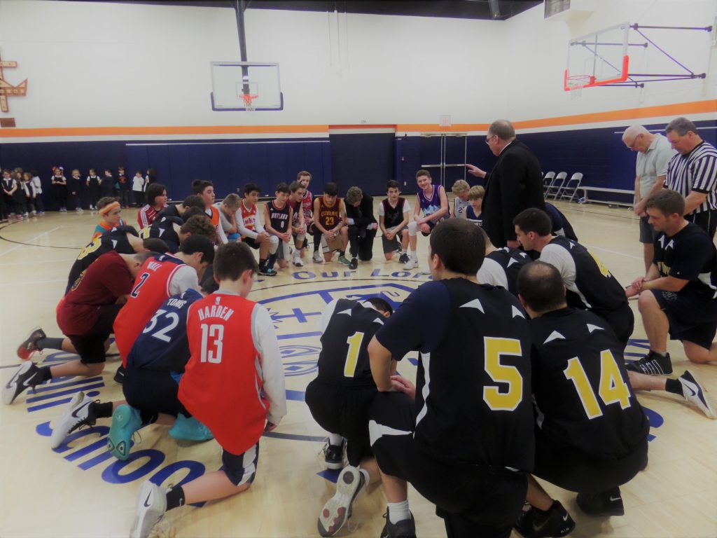 Prayer Break during hoops game between Cardinal Pacelli & mount Saint Mary's Seminary (Courtesy Photo)