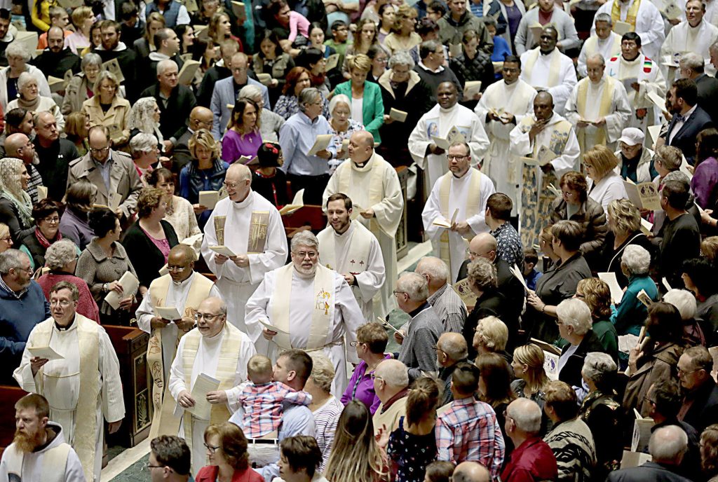 Priests from the Cincinnati Archdiocese enter during the Processional for the Chrism Mass at the Cathedral of Saint Peter in Chains in Cincinnati Tuesday, Mar. 27, 2018. (CT Photo/E.L. Hubbard)