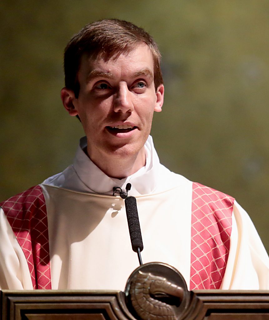 Deacon Jacob Willig reads the Holy Gospel during the Chrism Mass at the Cathedral of Saint Peter in Chains in Cincinnati Tuesday, Mar. 27, 2018. (CT Photo/E.L. Hubbard)