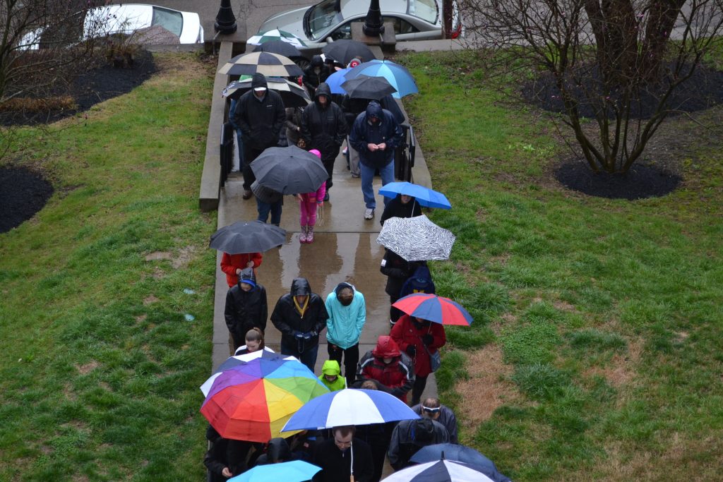 The final ascent begins off St. Gregory Street in Mt. Adams. This year umbrellas were a must for the journey. (CT Photo/Greg Hartrman)
