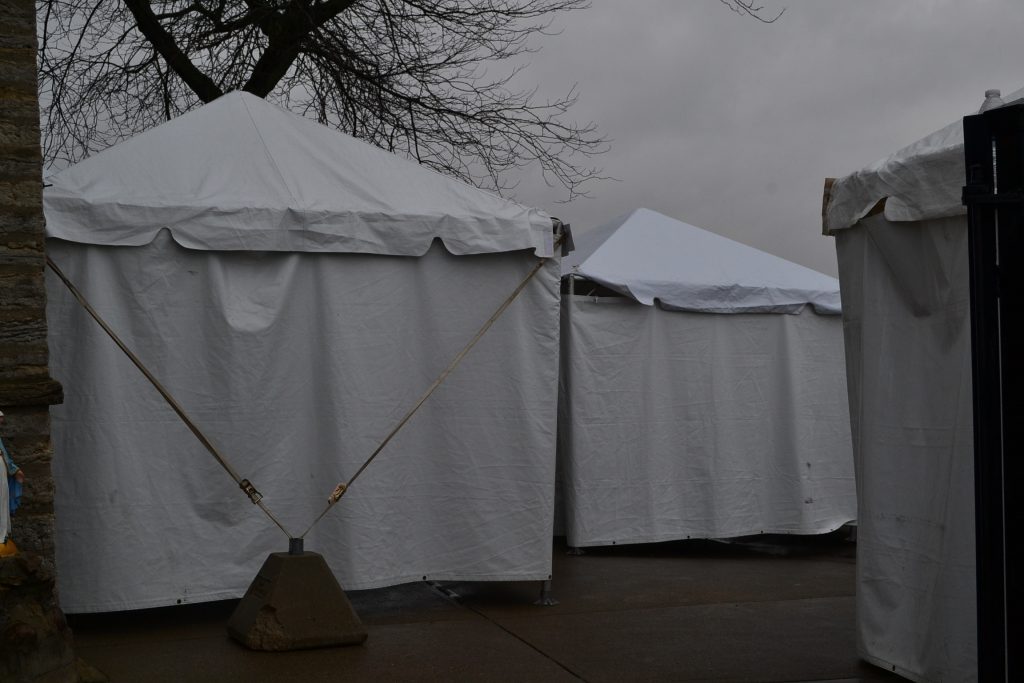 Three tents were set up for confession at Holy Cross Immaculata Church. (CT Photo/Greg Hartman)