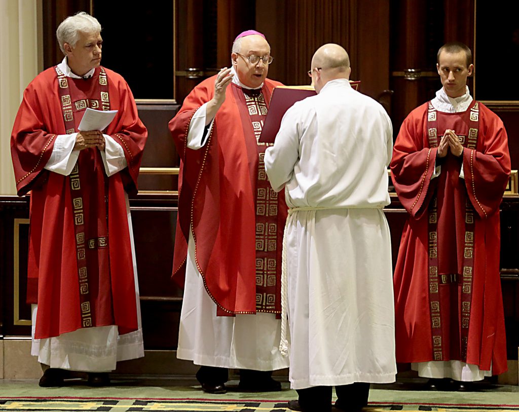 Bishop Joseph Binzer says the Opening Prayer for the Celebration of the Passion of the Lord at the Cathedral of St. Peter in Chains in Cincinnati on Good Friday, Mar. 30, 2018. (CT Photo/E.L. Hubbard)