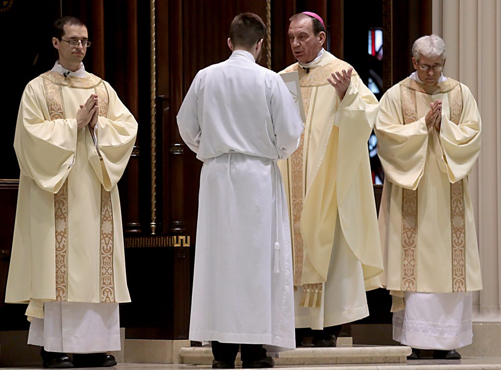 Archbishop Dennis Schnurr recites the Penitential Act during the Solemn Evening Mass of the Lord’s Supper on Holy Thursday at the Cathedral of Saint Peter in Chains Cathedral in Cincinnati March 29, 2018. (CT Photo/E.L. Hubbard)