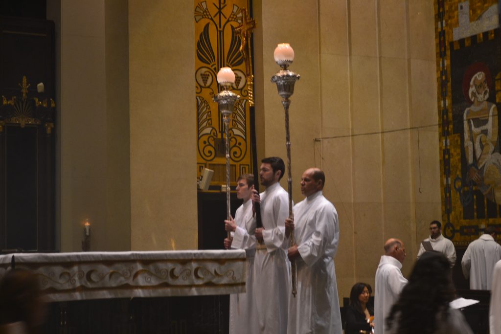 Acolytes during Easter Sunday Mass at the Cathedral. (CT Photo/ Greg Hartman)
