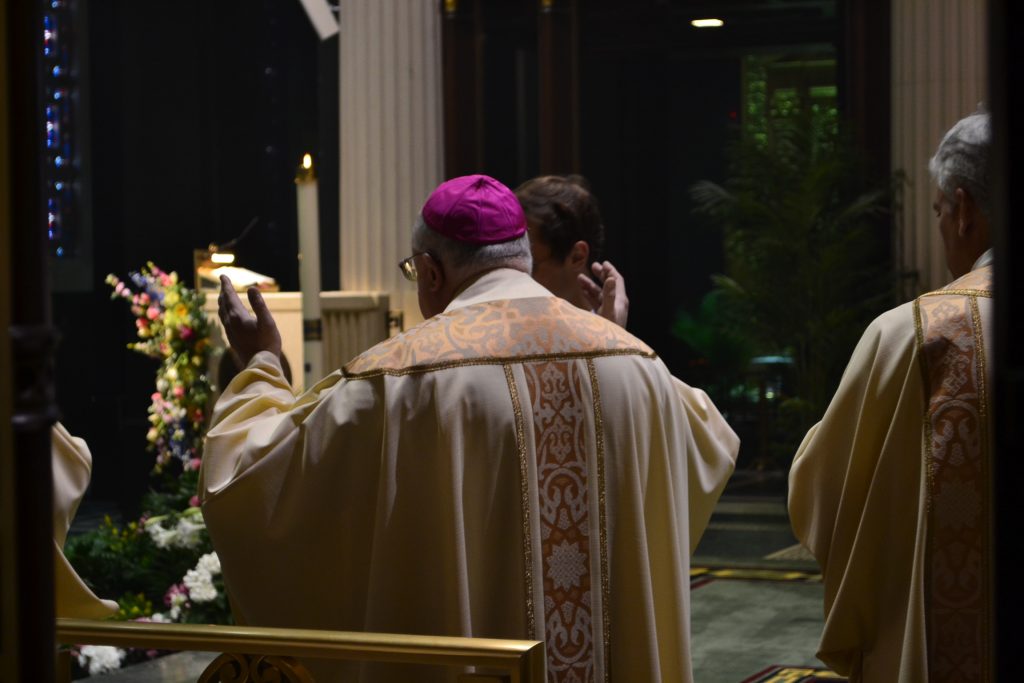 Bishop Joseph Binzer celebrant: "O God, who on this day, through your Only Begotton Son, have conquered death and unlocked for us the path to eternity... (CT Photo/Greg Hartman)