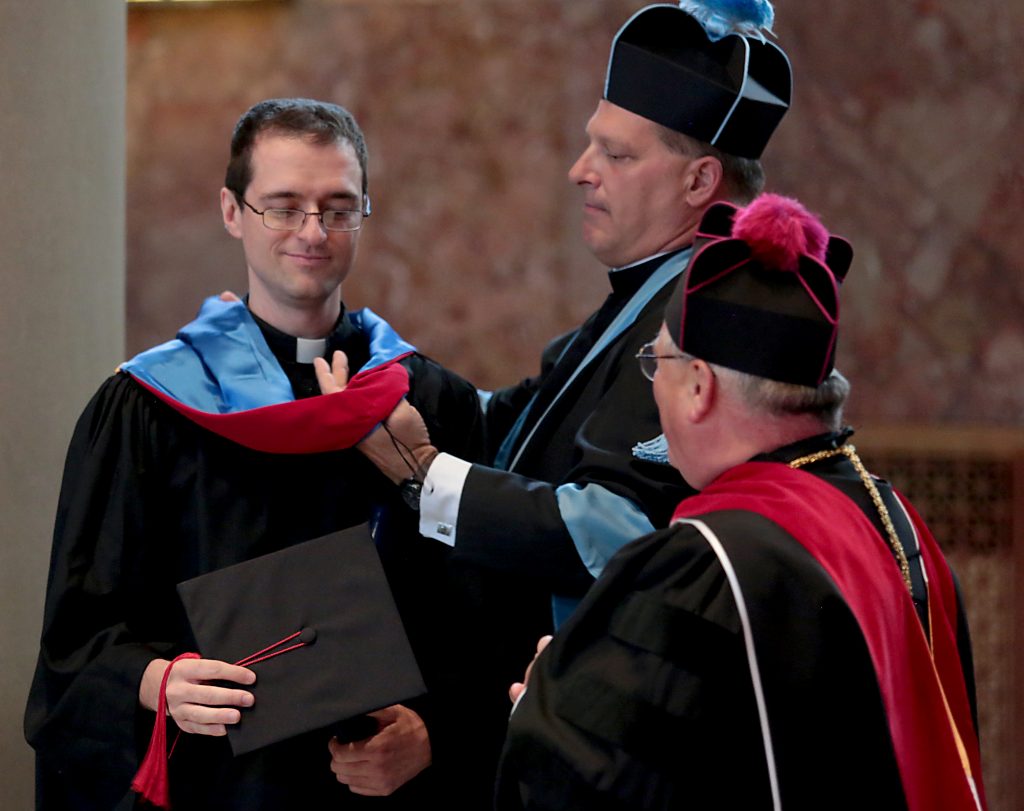 Deacon Andy Smith at the Athenauem of Ohio Graduation (Photo by EL Hubbard)