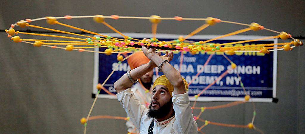 Shaheed Baba Deep Singh GAtka Academy of New York students perform during the first Festival of Faiths at the Cintas Center in Cincinnati Sunday, June 24, 2018. (CT Photo/E.L. Hubbard)