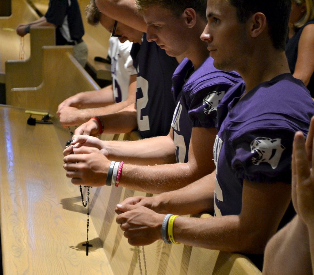 Men from Elder pray the Luminous Mysteries of the Rosary. The Rosary was led by Fr. Anthony Brausch, Rector of Mt. St. Mary's Seminary (CT Photo/Greg Hartman)