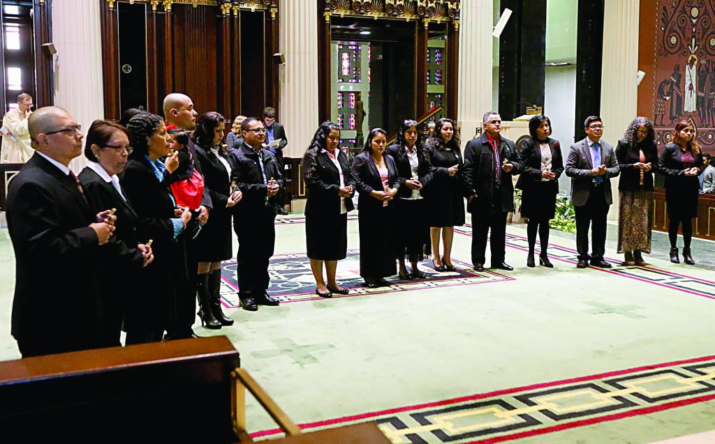 The Catechists stand before Archbishop Dennis Schnurr during the Misa de Graduacion en Catequesis Camina Con Cristo at Saint Peter in Chains Cathedral in Cincinnati Saturday, Nov. 3, 2018. (CT Photo/E.L. Hubbard)