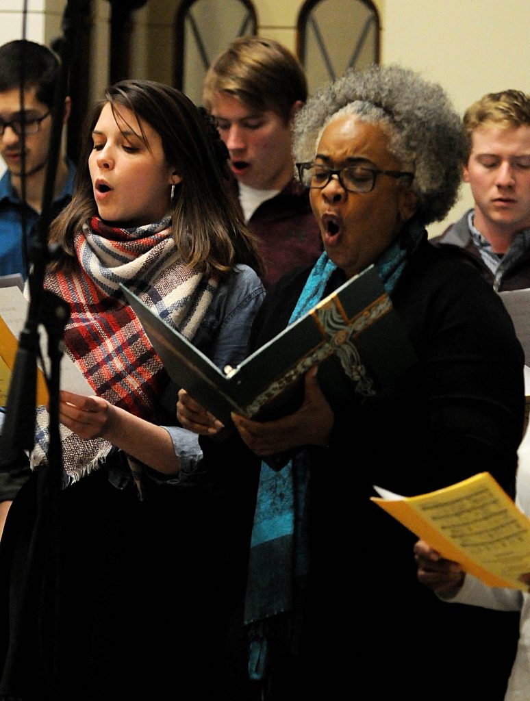 University of Dayton Senior Megan Earley(cq) and Church of the Resurrection choir member Rita Winters(cq) sing the prelude prior to UD's "Mass In Celebration of Black History Month," on Sunday, Feb. 10. (CT Photo/David Moodie)