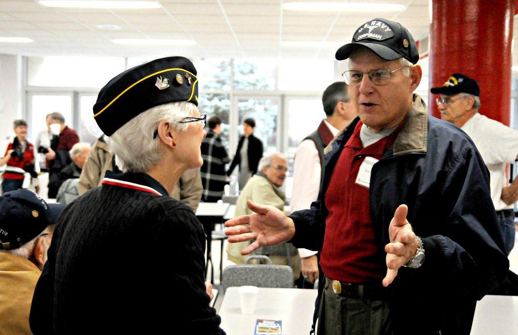 Navy veterans Peg Albert(cq) and Ken Baier(cq) talk in the La Salle High School cafeteria prior to the school's 5th Annual Veteran Appreciation Day program on Tuesday, Feb. 12. Albert was a nurse while Baier served as a corpsman. Baier is also a member of La Salle's first graduating class. (CT Photo/David Moodie)