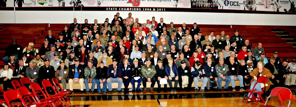 Veterans from the greater Cincinnati area gather for a group photograph following La Salle High School's 5th Annual Veteran Appreciation Day on Tuesday, Feb. 12. The annual event featured a "Missing Man" ceremony, a talk on women in the military by St. Ursula graduate Lt. Col. Angela F. Ochoa (cq), music, the recognition of all veterans and a luncheon for the veterans. (CT Photo/David Moodie)