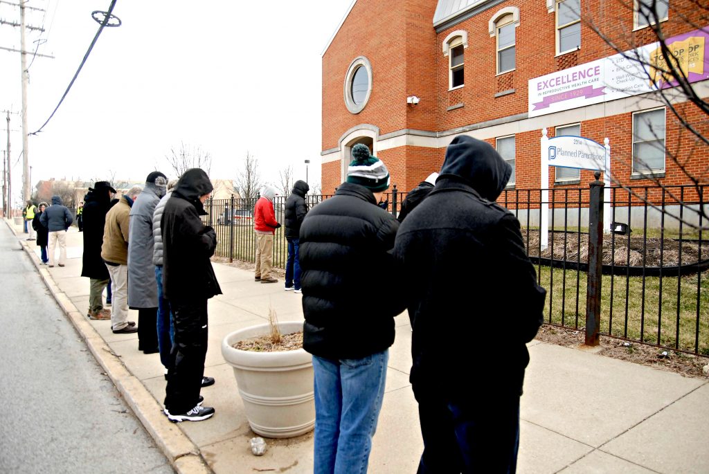 Members of "Helpers of God's Precious Infants" pray the rosary in front of Plannned Parenthood's Auburn Ave. Surgical Center on Saturday, Feb. 16. The group, which is praying for an end to abortion, holds a vigil at the center every first, third and fourth Saturday of the month. A similar vigil is conducted at Planned Parenthood's Westen Hills center on the second Saturday of each month. (CT Photo/David Moodie)