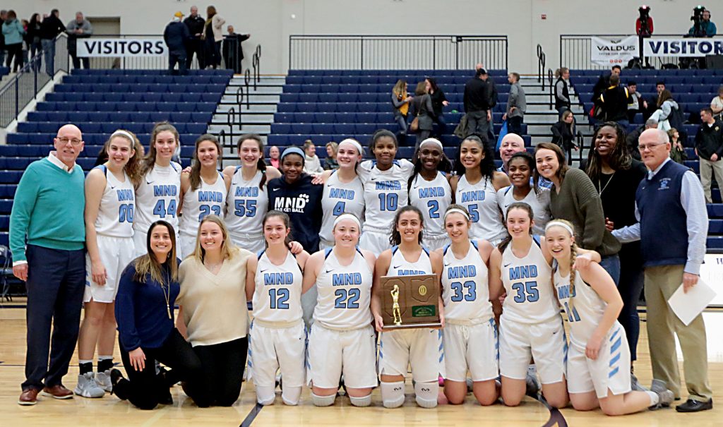 Mount Notre Dame holds their trophy after defeating Centerville in their Division I regional final at Trent Arena in Kettering Saturday, Mar. 9, 2019. (CT Photo/ EL Hubbard)