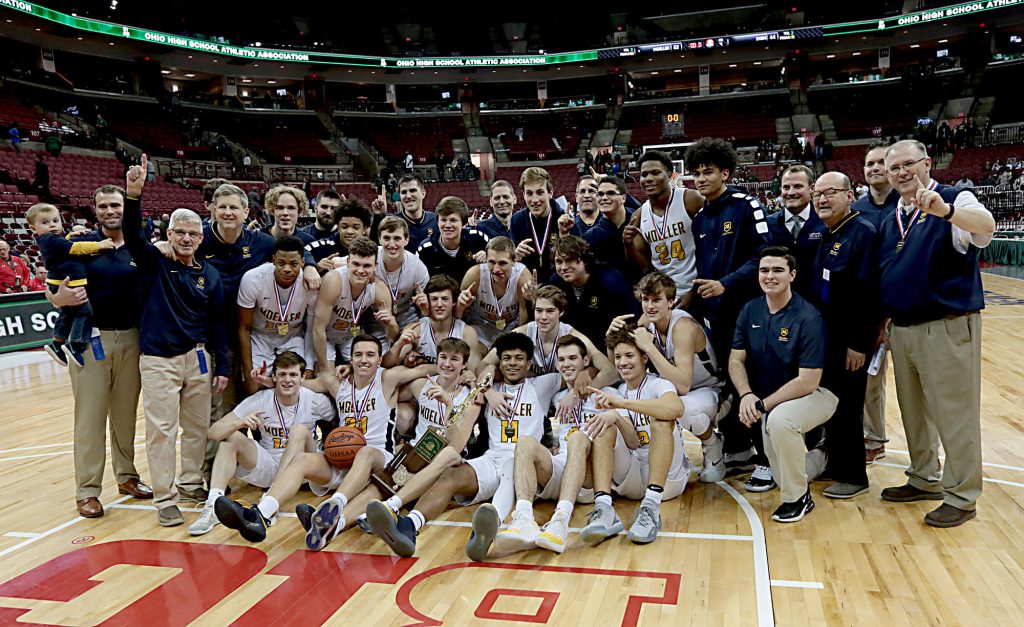Moeller poses with the state championship trophy after defeating St. Vincent-St. Mary at the Schottenstein Center in Columbus Saturday, March 23, 2019. (CT Photo/EL Hubbard)