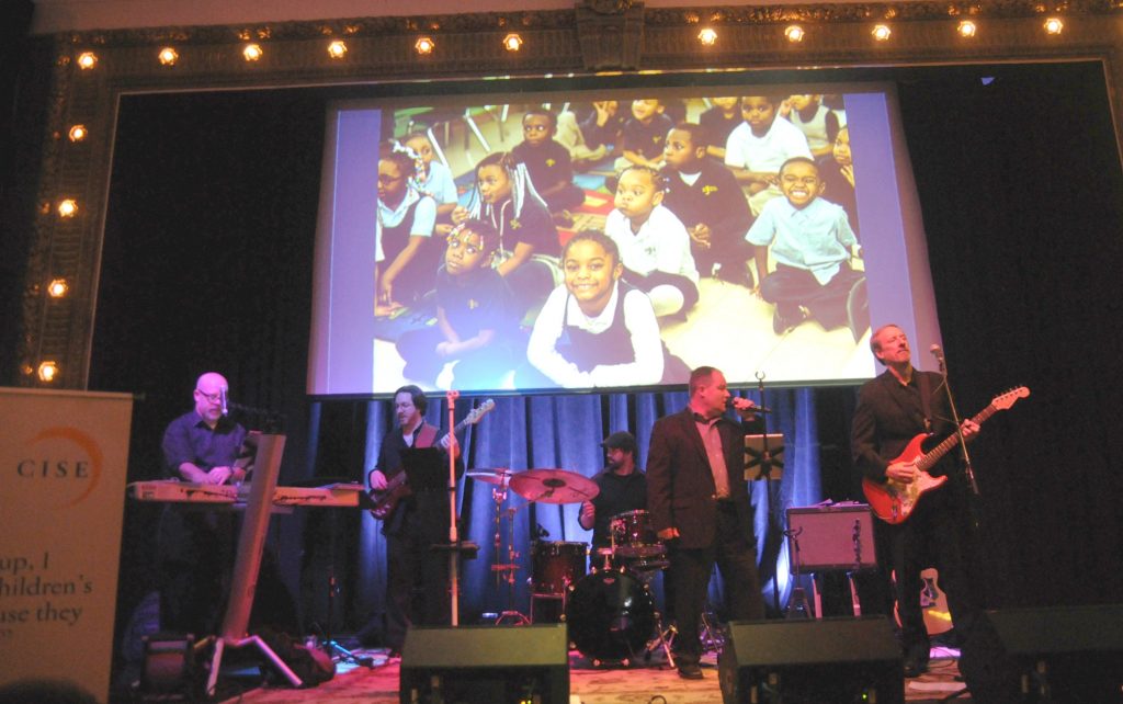 "All In" performs during Catholic Inner City Schools Education's Ninth Annual Fundraiser at the Woodward Theater in Over the Rhine on Saturday, April 6. CISE provides financial support for the eight urban schools in the Archdiocese of Cincinnati. This year's event featured music, a silent auction, raffles, food and an open bar. CISE hopes to raise $100,000 through the event. (CT Photo/David A. Moodie,)