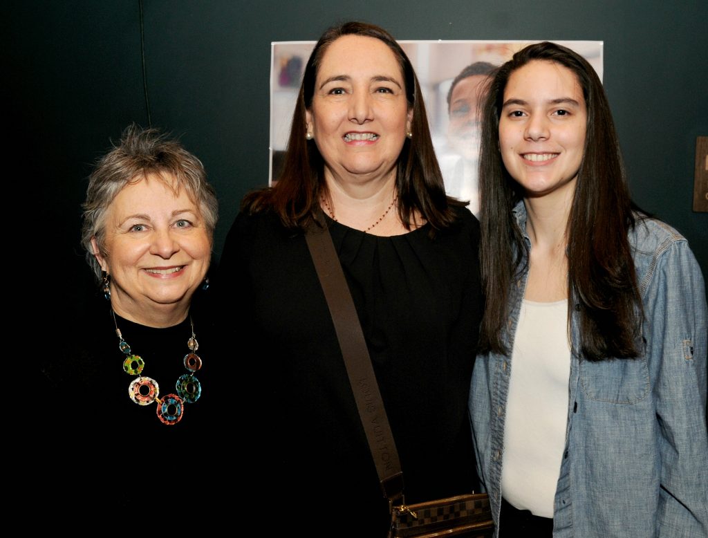 Mabe Rodriguez(cq), Executive Director of Catholic Inner City Schools Edcuation, center, Sharon Civitello(cq), left, and Bea Hernandez(cq), right, organized this year's CISE fundraiser. The event, which is in its ninth year, raises money for the Archdiocese of Cincinnati's eight urban schools. CISE hopes to raise $100,000 with this year's event. (CT Photo/David A. Moodie) 