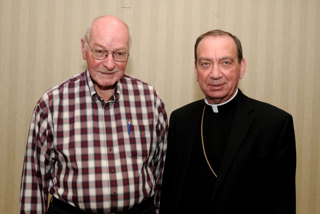 Archbishop Dennis M. Schnurr, right, stands with Ordination Class of 1959 member Father Eugene F. Vonderhaar(, left, during the Archdiocese of Cincinnati's annual Ordination Anniverssary Dinner at the Bergamo Center in Beavercreek, Ohio on Monday, May 6. (CT Photo/David A. Moodie)