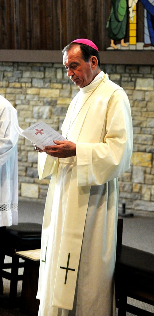 Archbishop Dennis M. Schnurr leads the congregation in vespers prior to the Archdiocese of Cincinnati's Ordination Annivesary Dinner at the Bergamo Center in Beavercreek, Ohio on Monday, May 6. This year's event recognized the service of the Ordination Classes of 1959, '69, '79 and '94. (CT Photo/David A. Moodie) 