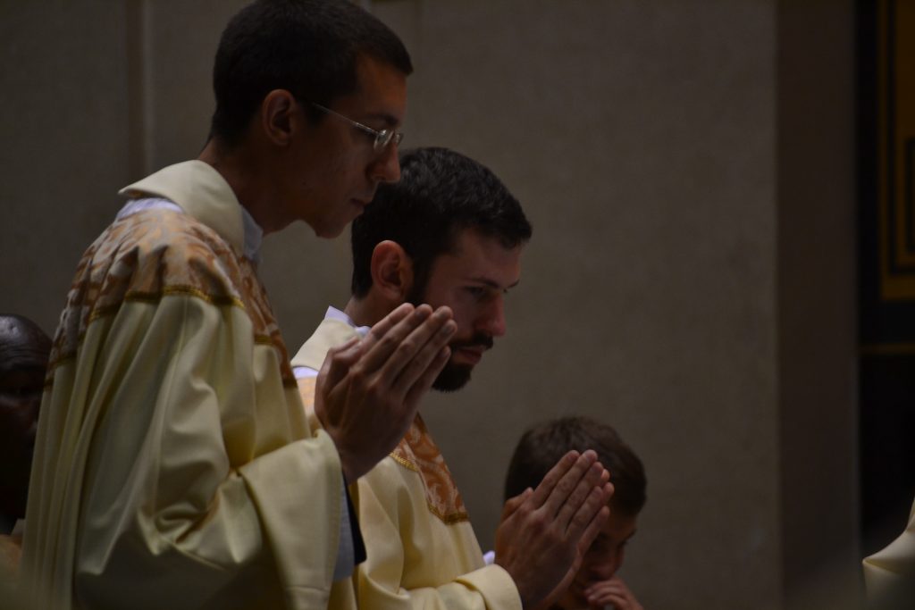 Father Christian Cone-Lombarte & Father Ambrose Dobrozsi during the Eucharistic Prayer. (CT Photo/Greg Hartman)