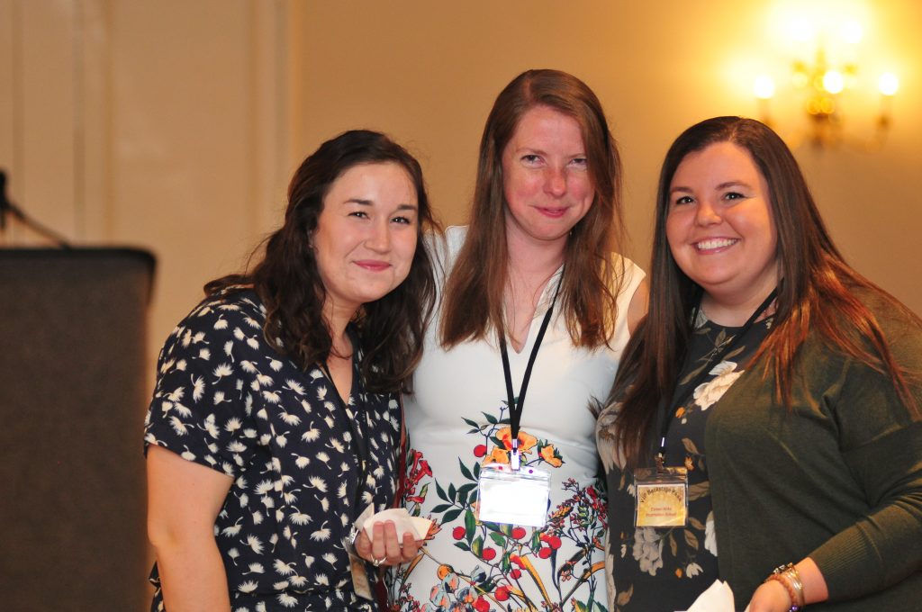 Teachers from Ascension School in Kettering and Incarnation School in Centerville socialize prior to the dinner beginning (CT Photo/Jeff Unroe)