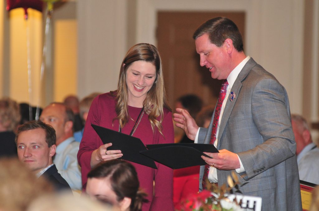 Carroll HS principal Matt Sibleski presents a 1st year teacher certificate to Elizabeth Emser (CT Photo/Jeff Unroe)