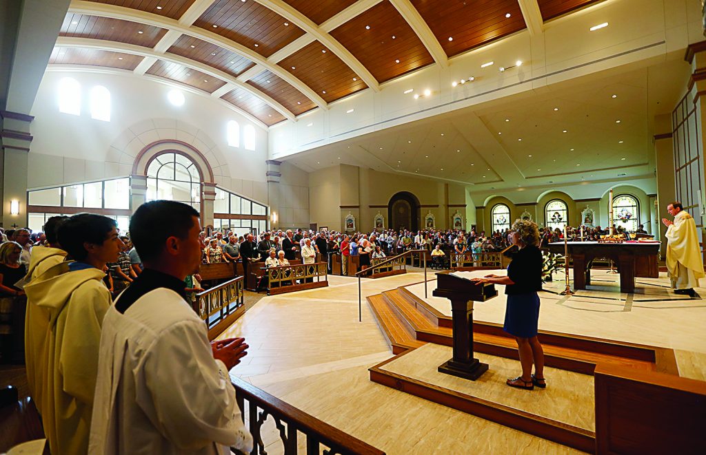 Archbishop Dennis Schnurr prepares the Holy Eucharist during the dedication of St. John the Baptist Church in Harrison Saturday, June 1, 2019. (CT Photo/E.L. Hubbard)