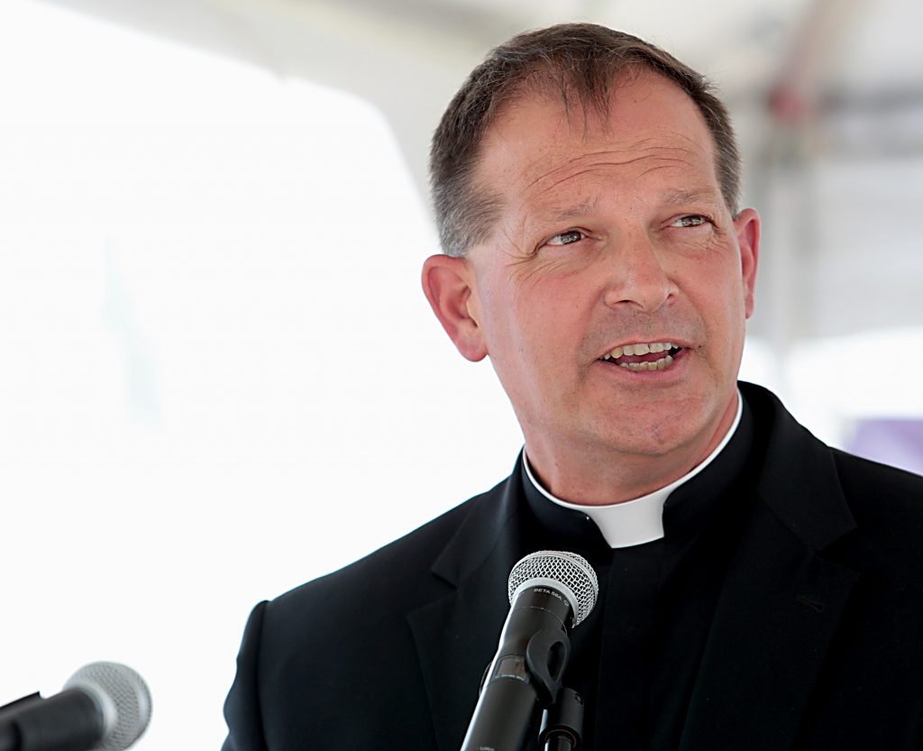 Fr. Anthony Brausch, rector of Mount Saint Mary’s Seminary, speaks during the Cross the Bridge for Life in Newport, Ky. Sunday, June 2, 2019. (CT Photo/E.L. Hubbard)