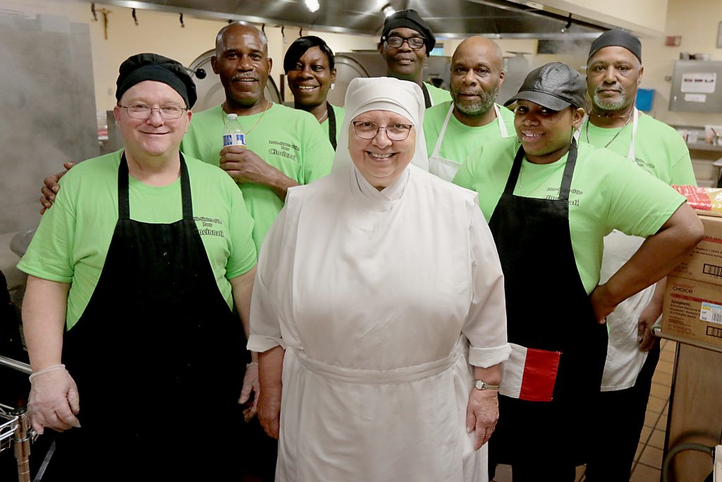 Sister Mary Imelda, center, and the crew that makes her spaghetti sauce, left to right, Mark Piotrowski, Germane Thomas, Linda Calhoun, Michael Jones, David Houze, Tay Greer, and Robert Miller. (CT Photo/E.L. Hubbard)