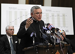 File Photo: Archbishop Charles J. Chaput of Philadelphia makes remarks during a news conference. (CNS photo/Tim Shaffer, Reuters) 