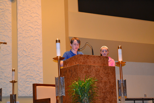 Mark Meyer, left, of St. Xavier High School, shared his thoughts as a student witness at the event.