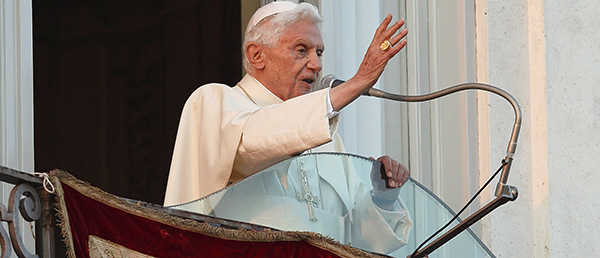 Pope Benedict XVI blesses people gathered in the town square after arriving in Castel Gandolfo, Italy, Feb. 28. It was his final public appearance before he drew to a close his papacy. âI am a simple pilgrim who begins the last stage of his pilgrimage on this earth,â he told the crowd. (CNS/Paul Haring) (Feb. 28, 2013) See BENEDICT-CASTELGANDOLFO (Feb. 28, 2013)