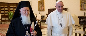 Pope Francis walks with Ecumenical Patriarch Bartholomew of Constantinople at Vatican