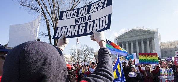 People demonstrate outside Supreme Court building as justices hear arguments in case against California's same-sex marriage ban