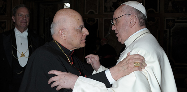 U.S. Cardinal George greets Pope Francis during March 15 audience