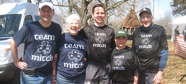 St. Antoninus Principal Jack Corey, center, poses with fellow members of Team Mitch. From left are Sean McHale, a cousin from Baltimore, Jack Corey’s mother Mary, Corey, his son Joseph, and his father Bill.