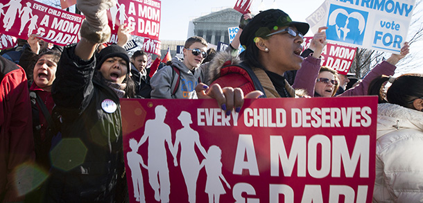 March file photo of people demonstrating as Supreme Court hears arguments in cases on same-sex marriage