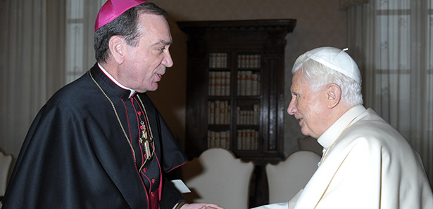 Pope Benedict XVI greets Archbishop Dennis M. Schnurr of Cincinnati during a Feb. 2 meeting with U.S. bishops on their "ad limina" visits to the Vatican.