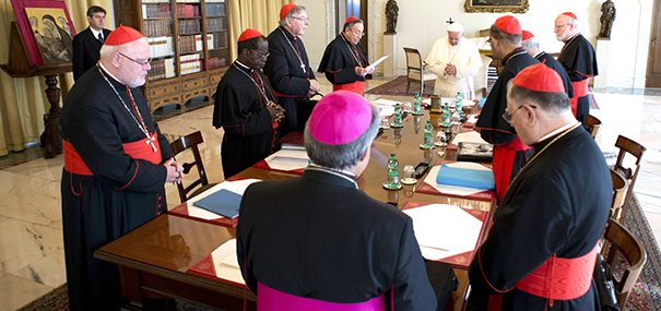 Pope Francis prays during a meeting with cardinals at the Vatican Oct. 1. As a series of consultations aimed at the reform of the Vatican bureaucracy began, the pontiff told his group of cardinal advisers that humility and service attract people to the church, not power and pride. (CNS photo/L'Osservatore Romano via Reuters) (Oct. 1, 2013) See POPE-CARDINALS Sept. 30, 2013 and POPE-HUMILITY Oct. 1, 2013.