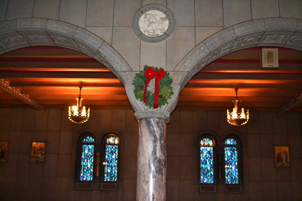 A wreath colors the walls of St. Louis Church in downtown Cincinnati. (CT Photo/John Stegeman)