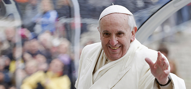 Pope Francis waves as he leaves general audience in St. Peter's Square at the Vatican