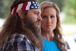 Willie and Korie Robertson star in the movie "God's Not Dead." The Catholic News Service classification is A-II -- adults and adolescents. The Motion Picture Association of America rating is PG -- parental guidance suggested. Some material may not be suitable for children. (CNS photo/Icon Media Group) 