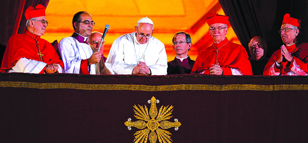 From the moment Pope Francis, dressed simply in a white cassock, stepped out on the balcony of St. Peter's Basilica for the first time and bowed March 13, 2013, he signaled his pontificate would bring some style differences to the papacy. (CNS photo/Paul Haring) (Feb. 27, 2014) See FRANCIS-STYLE Feb. 27, 2014.