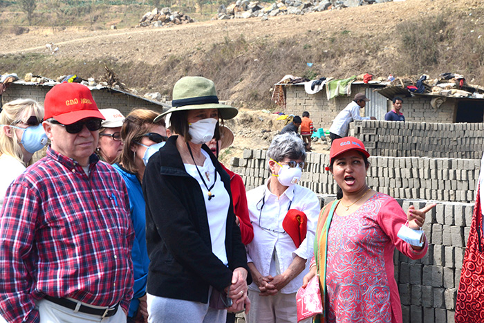 Founder of Care & Development Organization (CDO) Nepal, Arati Basnet takes the Archdiocese of Cincinnati group on a tour of the brick factory in Kathmandu, Nepal. (CT Photo/Megan Walsh)