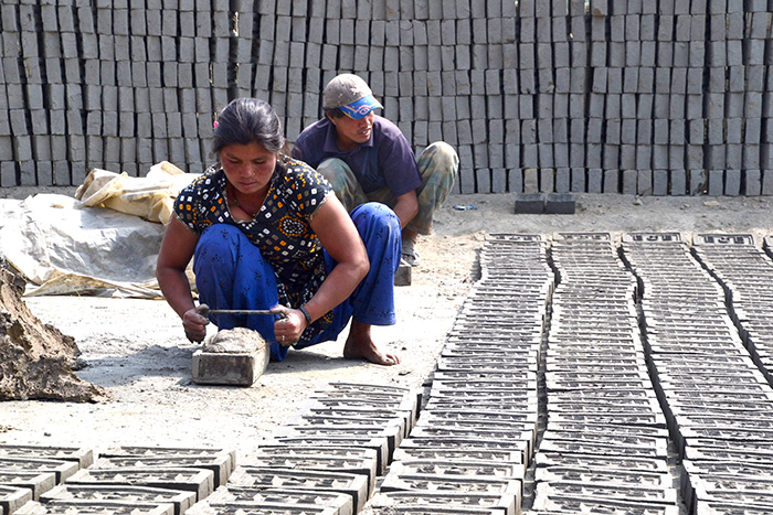 Brick factory workers labor for 12 to 14 hours to earn between $3 and $5 a day. (CT Photo/Megan Walsh)