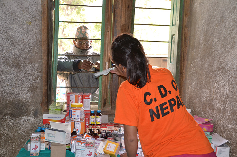 CDO hands out free medication and free eye glasses during their Mobile Health Clinic in a rural village outside of Kathmandu.