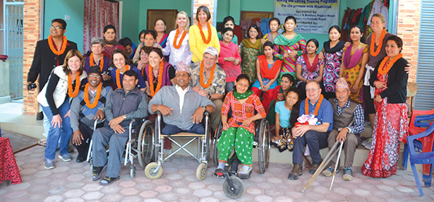 The Archdiocese of Cincinnati delegation posed for a photo with locals following an enjoyable morning with the Maryknoll Sewing Training Program listening to their challenges, but also hearing stories of hope, dreams and gratitude. (CT Photo/Megan Walsh)