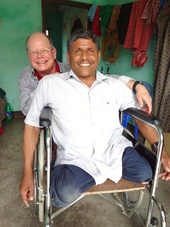 Maryknoll Missioner Father Joe Thaler enjoys visiting his friend, Govinda, at the Maryknoll Sewing Training Program outside of Kathmandy, Nepal (Courtesy photo)