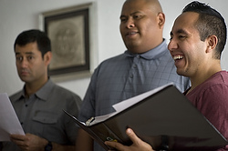 Seminarian laughs during chorus rehearsal at Hispanic seminary in Mexico City